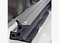 Extruded Rubber Profiles for at Grade Railroad Crossings